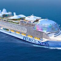 Recreación del Hero of the Seas de Royal Caribbean navegando en mar abierto, con la cúpula de cristal AquaDome en la proa y el parque acuático en la popa. Cortesía de Royal Caribbean International.
